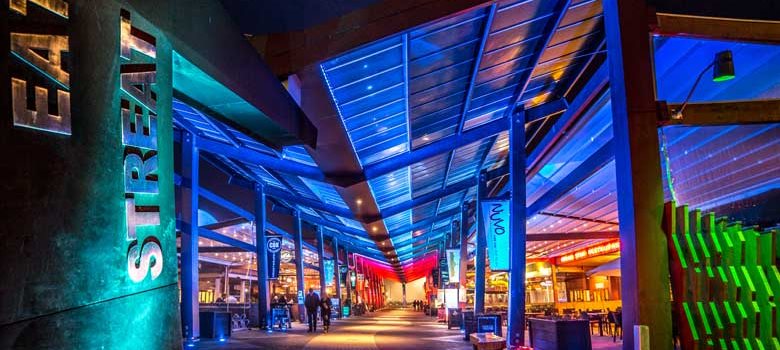 The Eat Street food court with colourful lights.