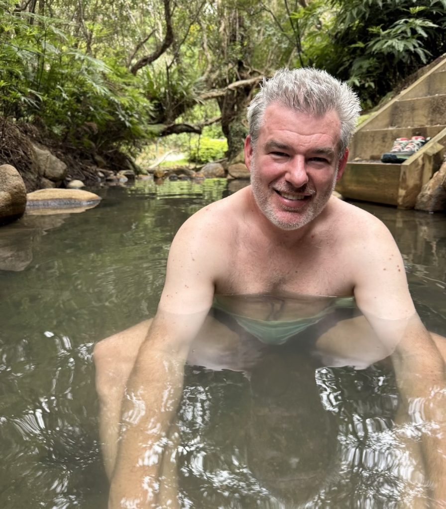 Nathan in the Kaitoke Springs on Great Barrier Island.